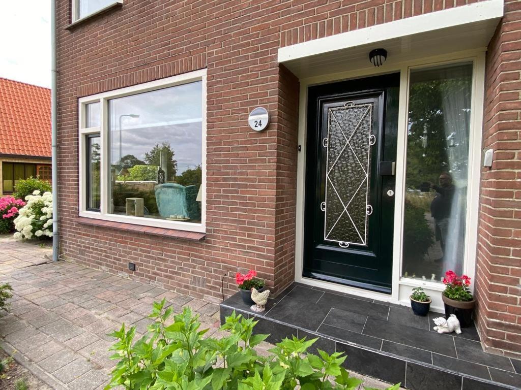 Huis Bij Het Water Met Sloepje Jutrijp Екстериор снимка